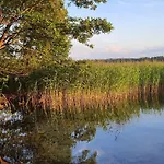 Сasa de vacaciones Mazurski Caloroczny Nad Jeziorem Z Jacuzzi Pasym