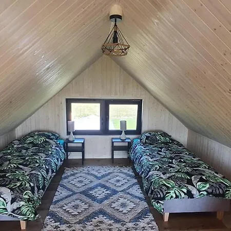 Mazurski Caloroczny Nad Jeziorem Z Jacuzzi Holiday home Pasym